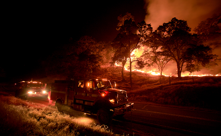 Cal Fire crews from Napa's Greenwood Ranch Station monitor the Rocky Fire, now 8,000 acres, Thursday  July 30, 2015. (Kent Porter / Press Democrat) 2015