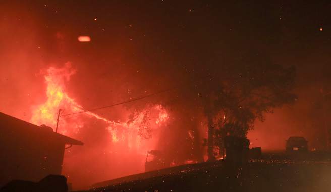A home burns in Hidden Valley as a result of the Vlley fire on Saturday. (Kent Porter / Press Democrat) 2015