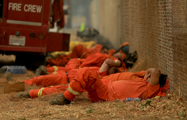 CDC firefighters get some rest in Middletown, Sunday Sept. 13, 2015. (Kent Porter Press Democrat) 2015