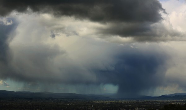 Rain and hail fall over the Alexander Valley as seen from Taylor Mountain Regional Park and Open Space Preserve Monday March 28, 2016. (Kent Porter / Press Democrat) 2016