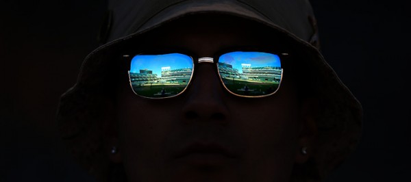 An Oakland Athletics fan looks out on the Oakland Coliseum during their home opener against the Chicago White Sox, Monday April 4, 2016. (Kent Porter / Press Democrat) 2016